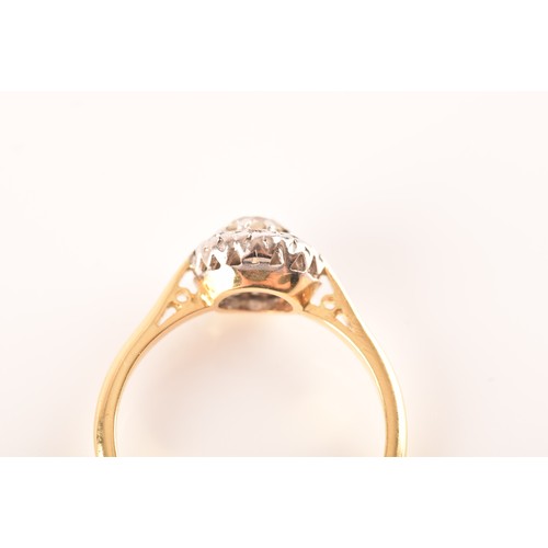 51 - A 18ct yellow gold diamond coronet cluster ring, set to centre with a round brilliant cut diamond se... 