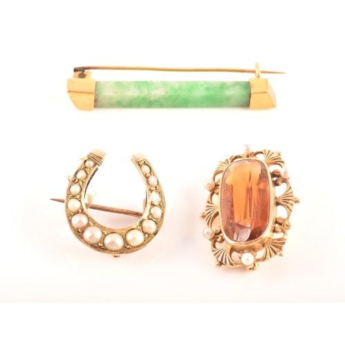 89 - A 14ct yellow gold citrine and pearl brooch, along with a yellow metal horse shoe pearl brooch, and ... 