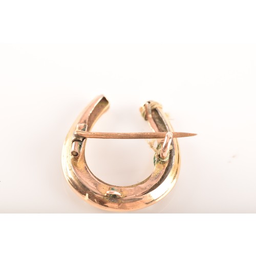 89 - A 14ct yellow gold citrine and pearl brooch, along with a yellow metal horse shoe pearl brooch, and ... 