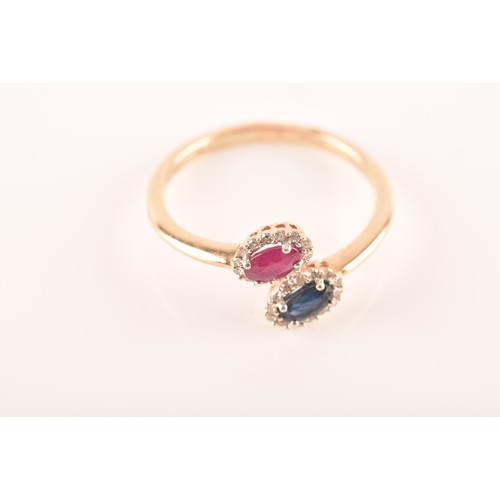 81 - A 9ct yellow gold ring, set to centre with an oval ruby with an approximate weight of 0.50 carats as... 