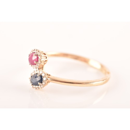 81 - A 9ct yellow gold ring, set to centre with an oval ruby with an approximate weight of 0.50 carats as... 