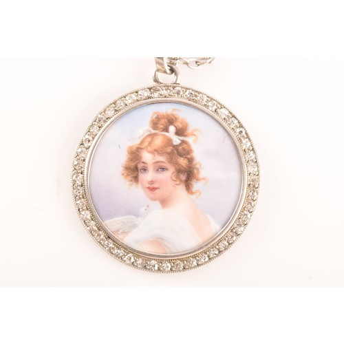 90 - An Edwardian painted porcelain pendant, surrounded by round eight cut diamonds with a millegrain bor... 