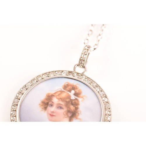 90 - An Edwardian painted porcelain pendant, surrounded by round eight cut diamonds with a millegrain bor... 