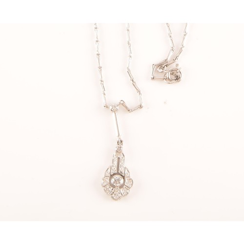 29 - An 18ct white gold drop pendant, featuring a brilliant cut diamond to the centre with an approximate... 