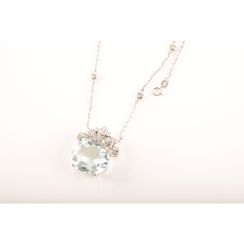 11 - A platinum pendant and chain, featuring an oval aquamarine with an approximate weight of 12.00 carat... 