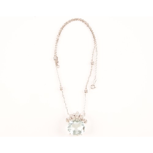 11 - A platinum pendant and chain, featuring an oval aquamarine with an approximate weight of 12.00 carat... 