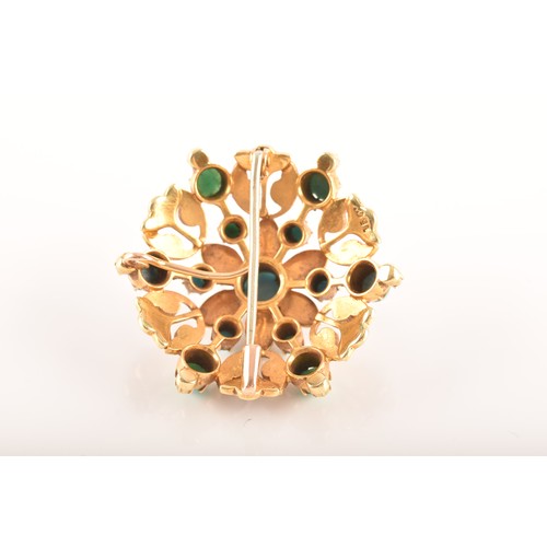 83 - A yellow gold brooch featuring cabochon turquoise and pearls, measuring approximately 3.5cm, 12.8 gr... 