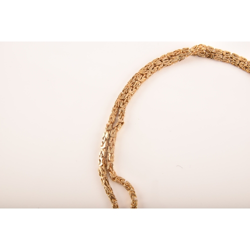 15 - A 9ct yellow gold fancy link chain, measures 71cm in length, full hallmarks for London 1980, 28.4 gr... 