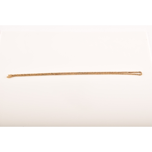 15 - A 9ct yellow gold fancy link chain, measures 71cm in length, full hallmarks for London 1980, 28.4 gr... 