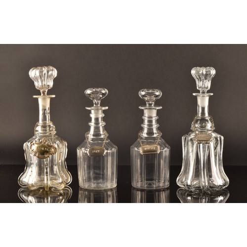 300 - Two pairs of 19th century cut lead glass decanters and stoppers, with silver plated decanter labels ... 