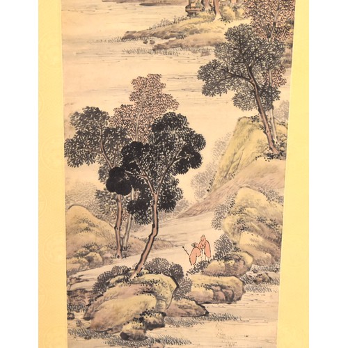 250 - A mid 20th century Chinese painted scroll, depicting an extensive landscape scene with trees and bui... 