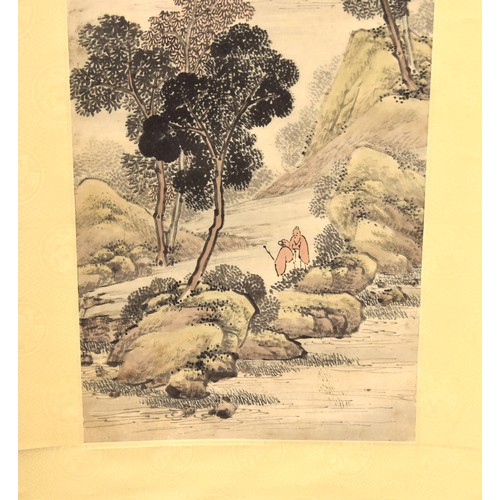 250 - A mid 20th century Chinese painted scroll, depicting an extensive landscape scene with trees and bui... 