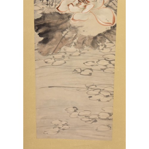 251 - A mid 20th century Chinese painted scroll, depicting a scene of leaves and flowers over lillies on w... 