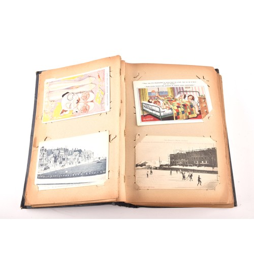 312 - Postcards. Two early 20th century postcard albums, with postcards of a variety of topics including i... 