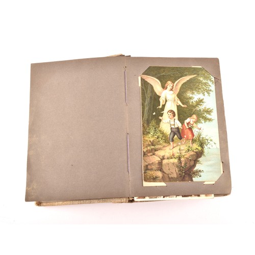 312 - Postcards. Two early 20th century postcard albums, with postcards of a variety of topics including i... 