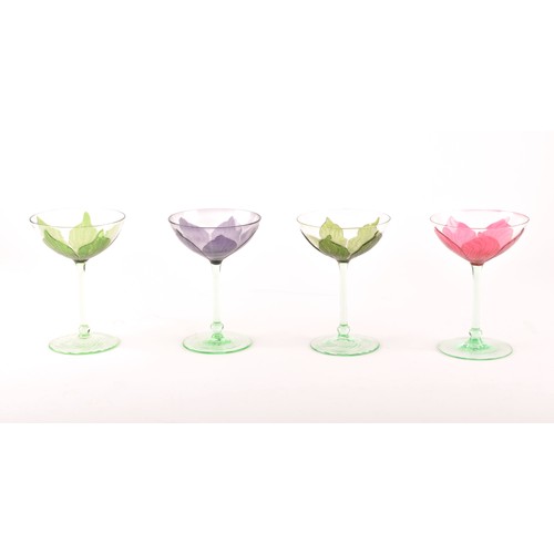 302 - A rare Harlequin set of four Ehrenfeld Art Nouveau champagne or cocktail glasses, circa 1900, of flo... 