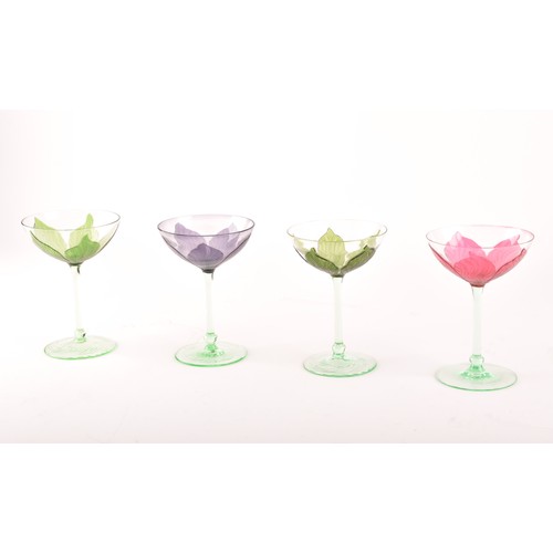 302 - A rare Harlequin set of four Ehrenfeld Art Nouveau champagne or cocktail glasses, circa 1900, of flo... 