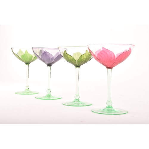 302 - A rare Harlequin set of four Ehrenfeld Art Nouveau champagne or cocktail glasses, circa 1900, of flo... 