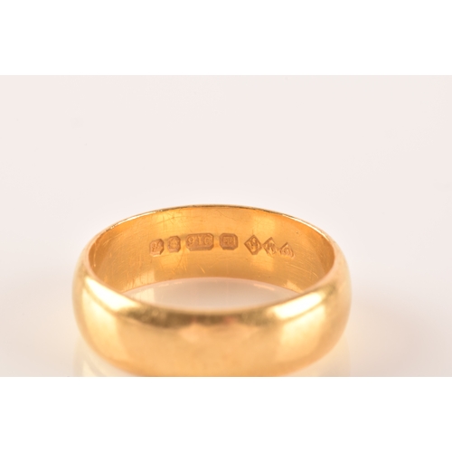 17 - A 22ct yellow gold wedding band ring, of smooth design, hallmarked 916 to interior, size M.