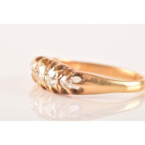 18 - A late 19th / early 20th century 18ct yellow gold and diamond ring, set with five graduated old-cut ... 