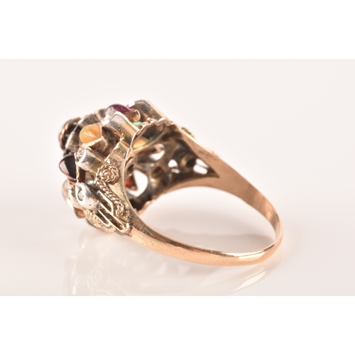 26 - A yellow metal, diamond, and multi-gem princess ring, of domed design, set with garnet, tigers eye, ... 