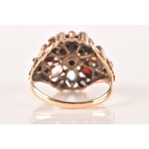 26 - A yellow metal, diamond, and multi-gem princess ring, of domed design, set with garnet, tigers eye, ... 