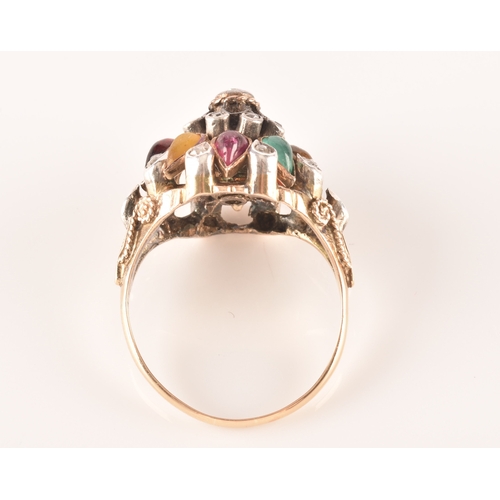 26 - A yellow metal, diamond, and multi-gem princess ring, of domed design, set with garnet, tigers eye, ... 