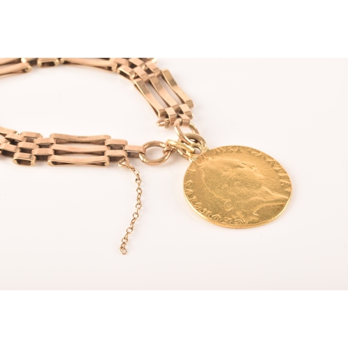 52 - A 9ct yellow gold gate-link bracelet, suspended with a George III spade guinea coin, the bracelet ma... 