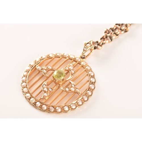 21 - An Edwardian 9ct yellow gold, peridot, and split seed pearl pendant, centred with quatrefoil design ... 