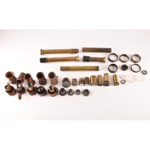 307 - A box of miscellaneous telescope items, including an R & J Beck Ltd brass telescope draw (with g... 