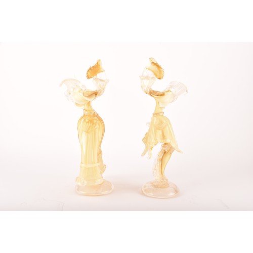 303 - A pair of Venetian Murano glass decorative figures, in gilt and white glass, in the form of a man an... 