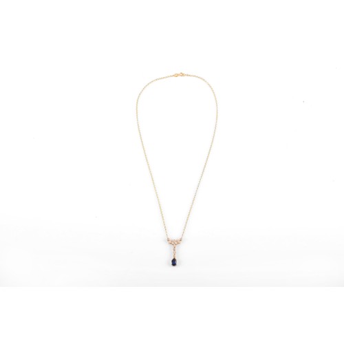 93 - An 18ct yellow gold sapphire and diamond necklace, featuring a pear cut sapphire with an approximate... 