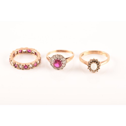 73 - A 9ct yellow gold, red and white paste stone eternity ring, size K, a 9ct yellow gold red and white ... 