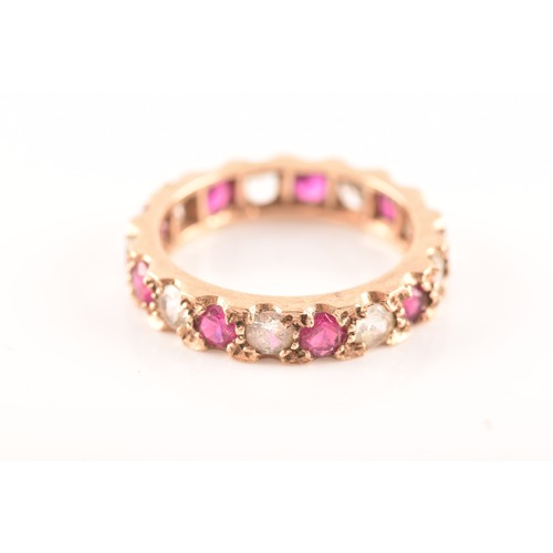 73 - A 9ct yellow gold, red and white paste stone eternity ring, size K, a 9ct yellow gold red and white ... 