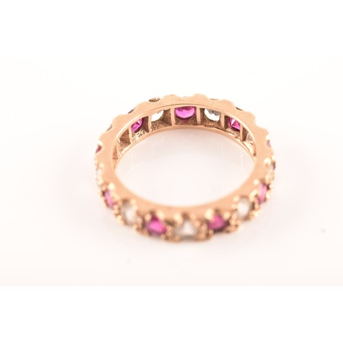 73 - A 9ct yellow gold, red and white paste stone eternity ring, size K, a 9ct yellow gold red and white ... 