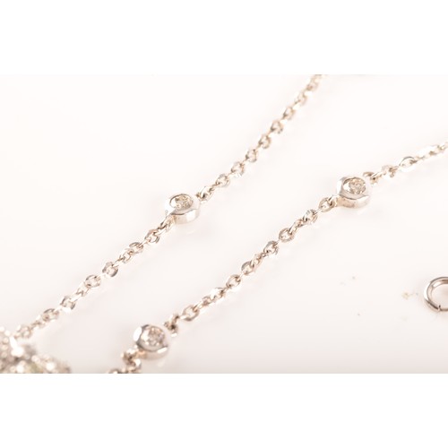 80 - A 18ct white gold pendant and chain, featuring an oval aquamarine with an approximate weight of 12.0... 