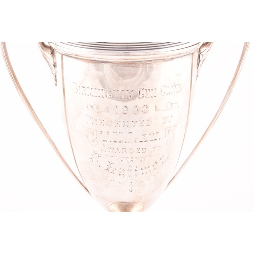 174 - A Edward VII silver trophy cup and cover, hallmarked Birmingham 1908 by Elkington & Co Ltd, twin... 