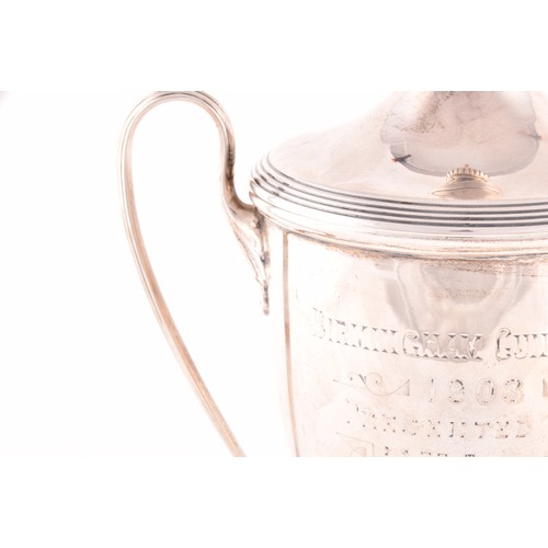 174 - A Edward VII silver trophy cup and cover, hallmarked Birmingham 1908 by Elkington & Co Ltd, twin... 