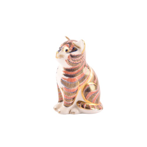 259 - A group of three early 21st century Royal Crown Derby pieces, to include a sitting cat paperweight w... 