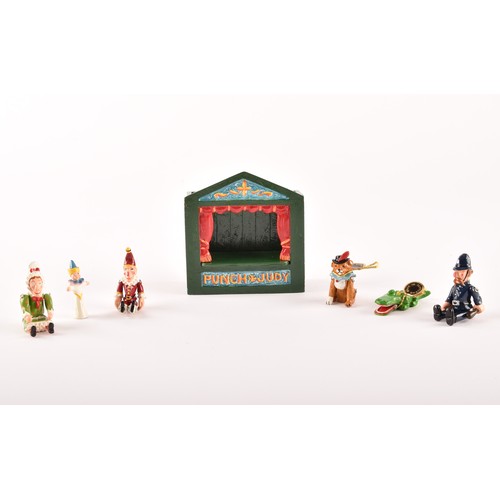 254 - Hantel Victorian Miniatures, Punch and Judy Theatre, comprising of six pewter hand cold-painted meta... 