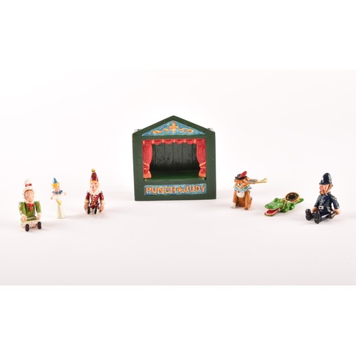 254 - Hantel Victorian Miniatures, Punch and Judy Theatre, comprising of six pewter hand cold-painted meta... 