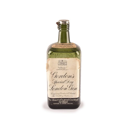 297 - A mid 20th century bottle of Gordons Special Dry London Gin, 70° Proof, no bottle size stated but be... 