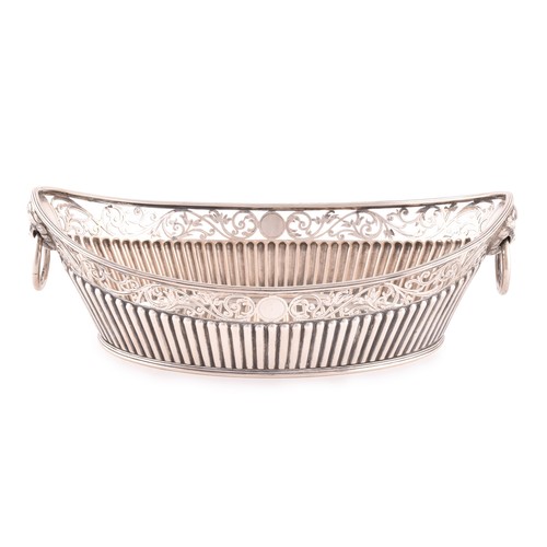 207 - A Victorian silver bon bon dish, hallmarked England 1859 by C.F, boat shaped with half ribbed decora... 