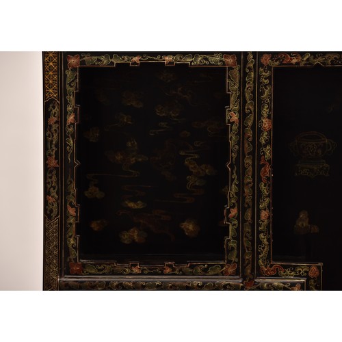 39 - A modern Japanese black lacquer display cabinet, gilt and polychrome decorated, the upper section wi... 