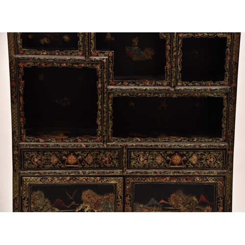 39 - A modern Japanese black lacquer display cabinet, gilt and polychrome decorated, the upper section wi... 