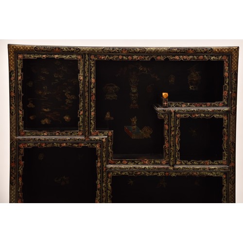 39 - A modern Japanese black lacquer display cabinet, gilt and polychrome decorated, the upper section wi... 