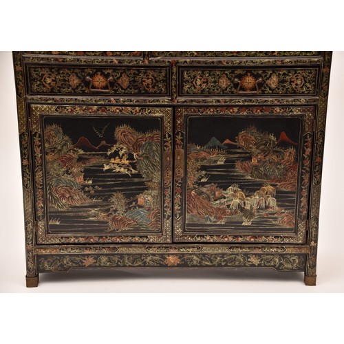 39 - A modern Japanese black lacquer display cabinet, gilt and polychrome decorated, the upper section wi... 