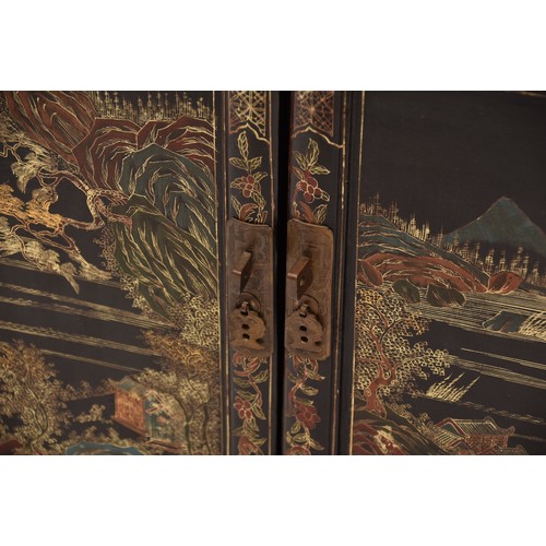 39 - A modern Japanese black lacquer display cabinet, gilt and polychrome decorated, the upper section wi... 