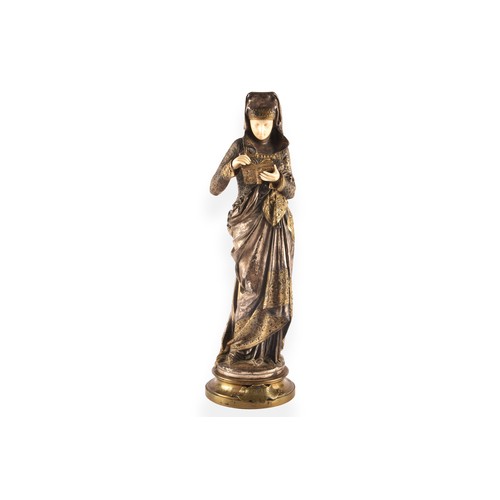 239 - Albert Carrier Belleuse (French, 1824-1887). A silvered, gilt bronze and ivory model of 'La Liseuse’... 