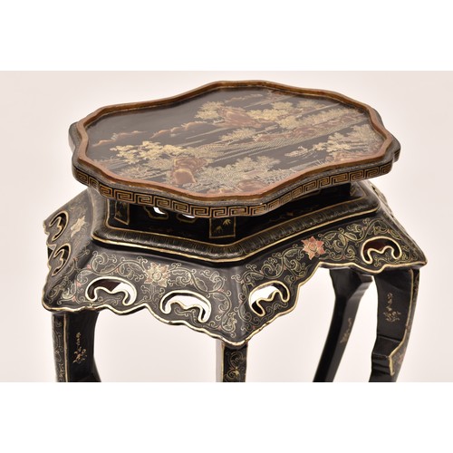 48 - A large Japanese black lacquer jardiniere stand, the top deorated with an extensive mountainous lans... 